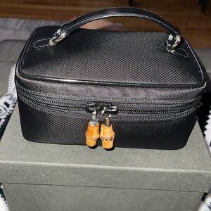 Preloved Gucci vanity mini bag great for travel make up. Pristine condition
